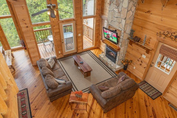 Looking down at the living room at Auburn Sky, a 4 bedroom cabin rental located in Pigeon Forge