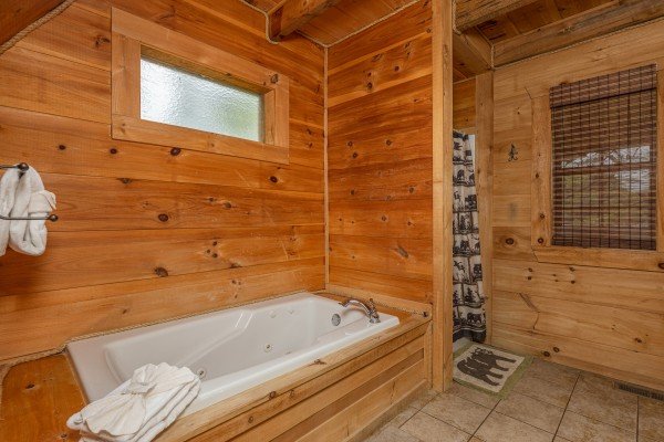 Jacuzzi & shower at Auburn Sky, a 4 bedroom cabin rental located in Pigeon Forge