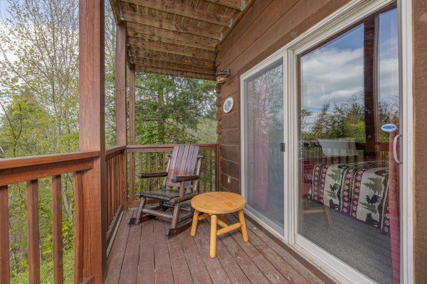 Deck glider at Mountain Laurel Lodge, a 4 bedroom cabin rental located in Pigeon Forge