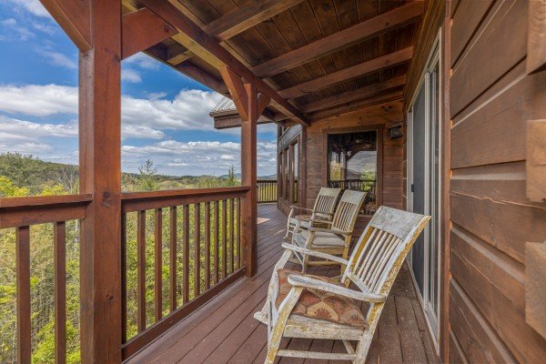 Deck rocking chairs at Mountain Laurel Lodge, a 4 bedroom cabin rental located in Pigeon Forge