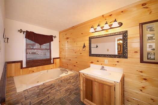 Attached bath with jacuzzi tub at Perfection! A 3 bedroom cabin rental located in Gatlinburg